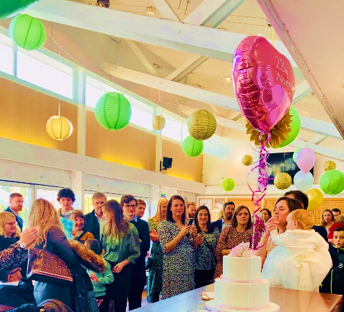 Birthday celebration with cake and balloons